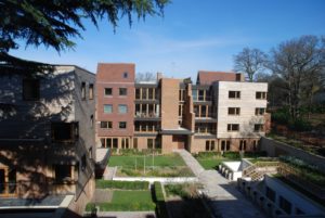 Outside view of the Bishops Avenue apartments after windows and doors are fitted