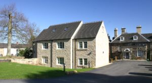 Rear view of Holbrook hall in Derbyshire after Gowercroft fitted heritage windows to the new extension