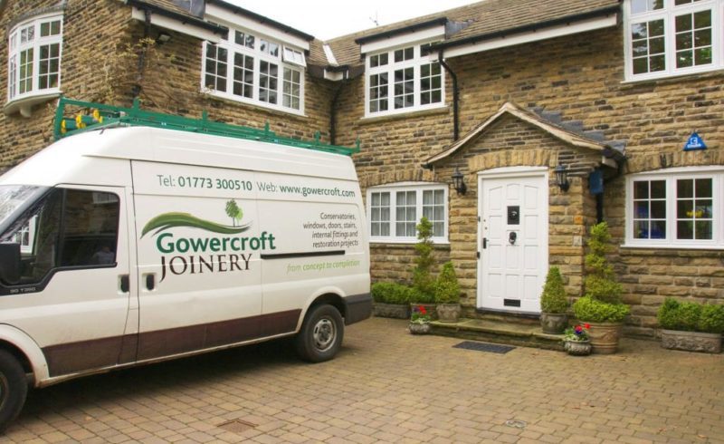 The gowercroft window fitting team outside a home
