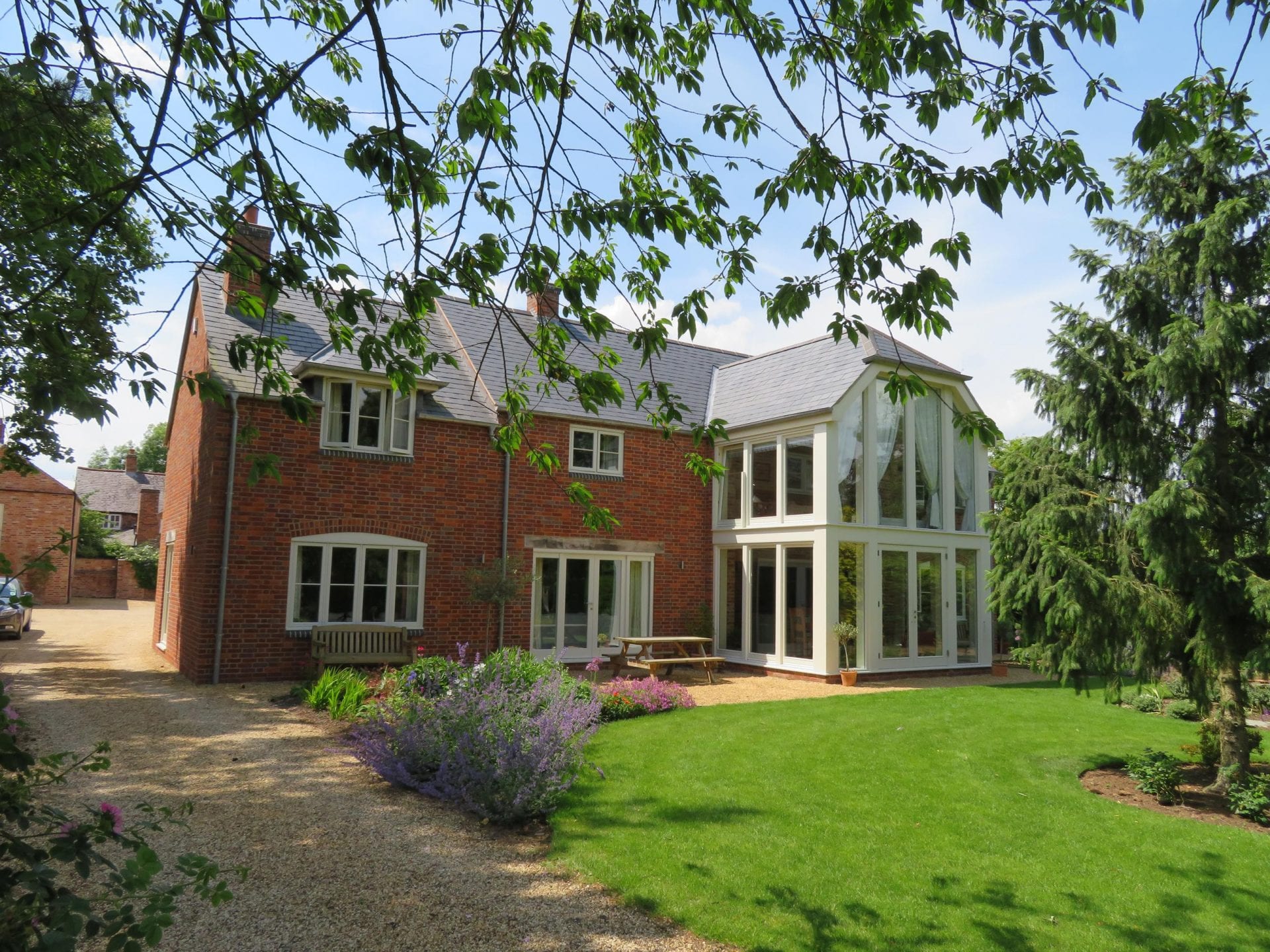 Image of 2 storey wooden conservatory by Gowercroft