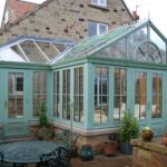 Garden room with farrow and ball painted hardwood conservatory