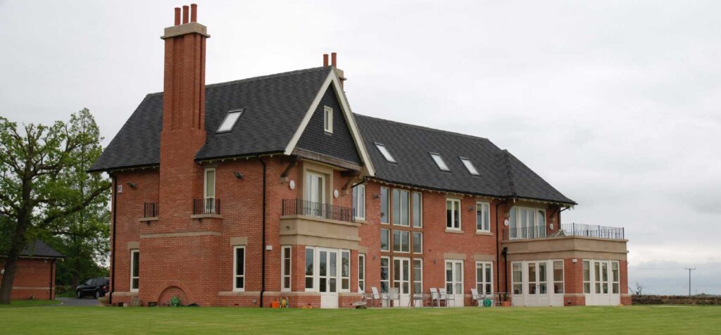 The Pastures long view with new wooden windows