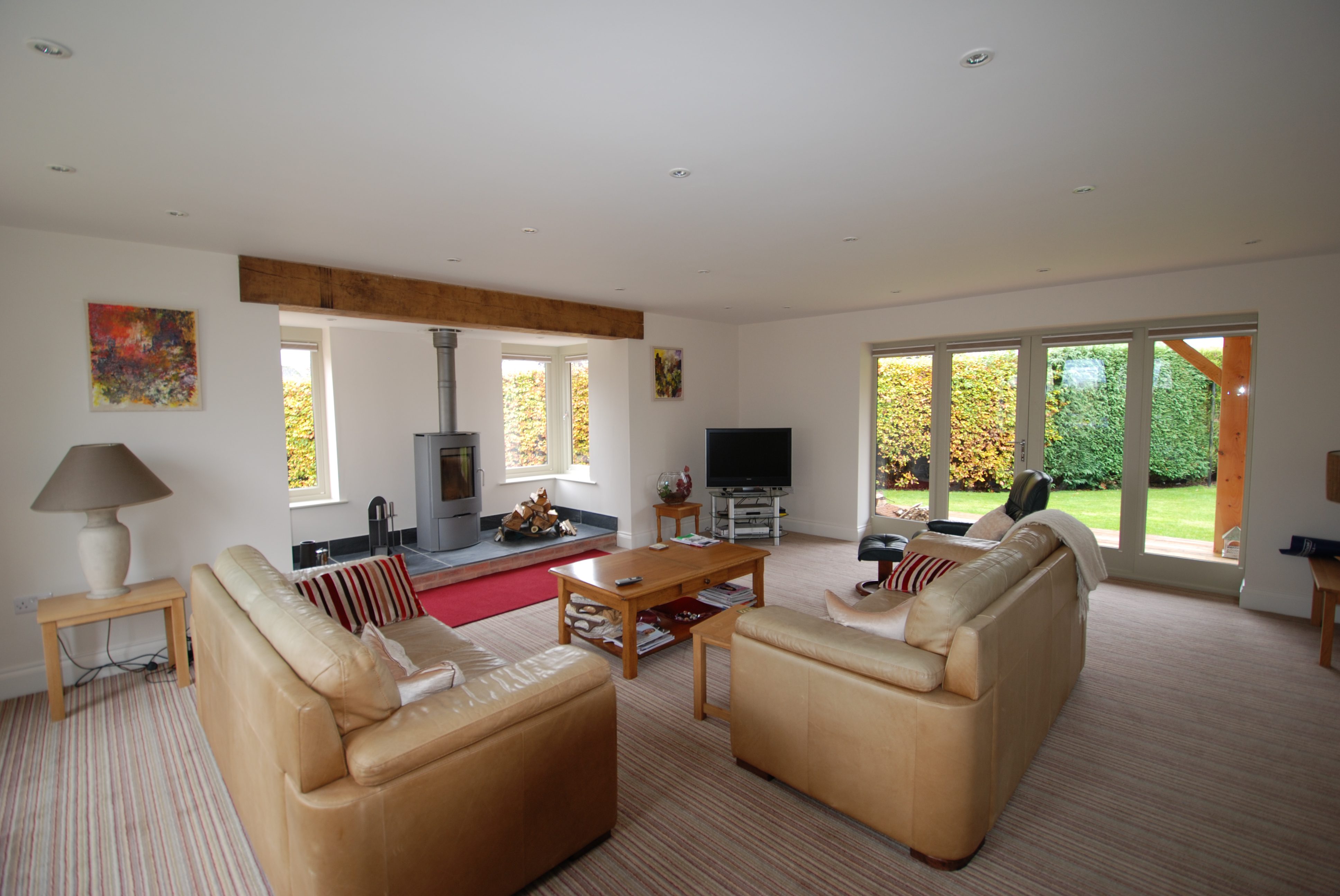 Internal view of Hardwick casement windows and Tutbury bifold doors