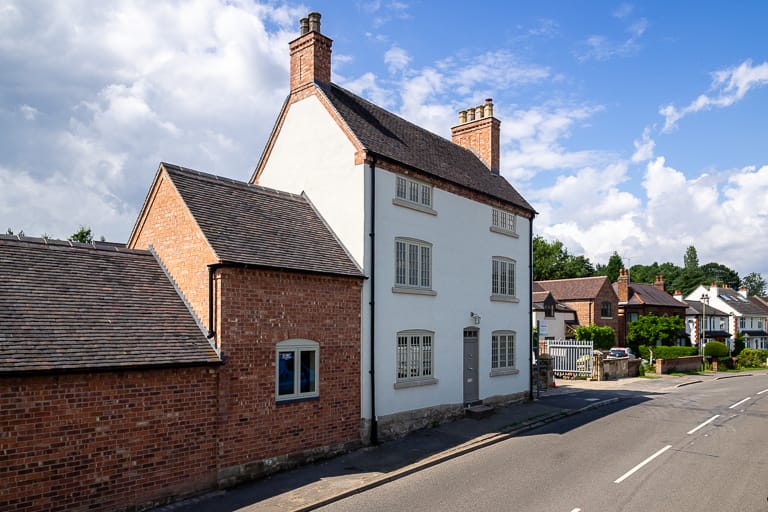 Melbourne arms after restoration to a residential property with traditional windows and doors