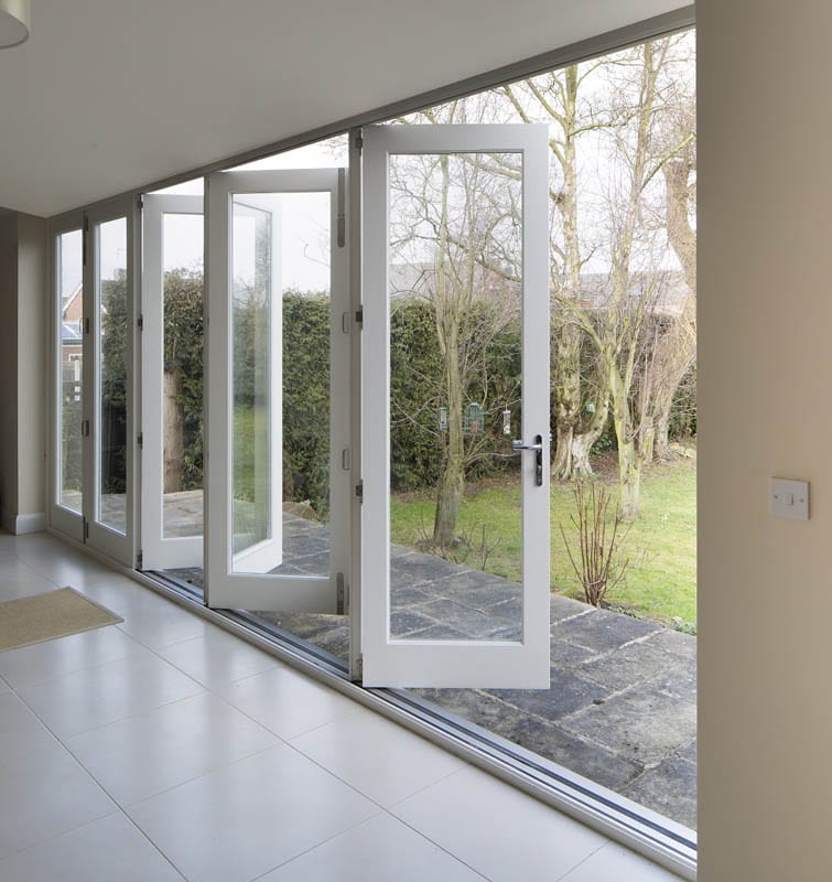 image of Halifax heritage bifold doors internal open in a restoration project living room