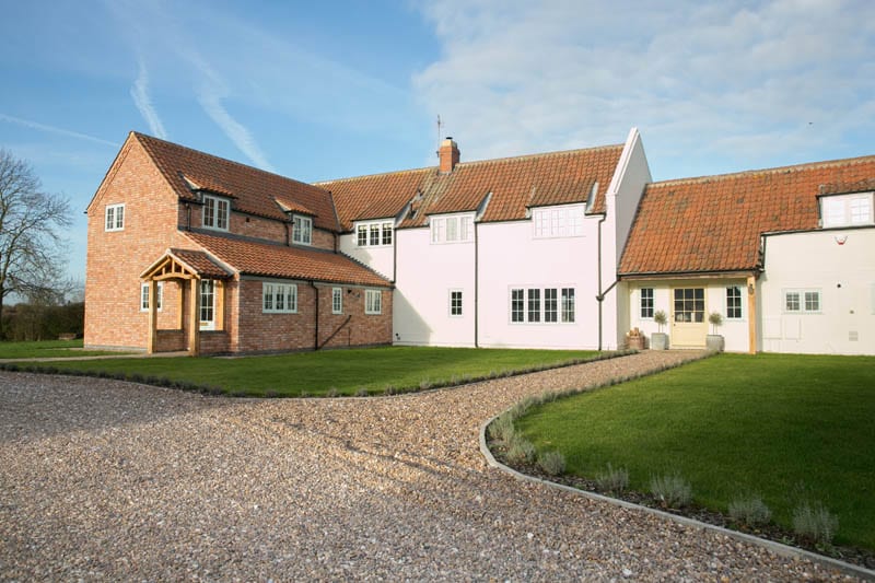 White Cottage replacement windows main image showing hardwick timber casement windows and the extension to the property