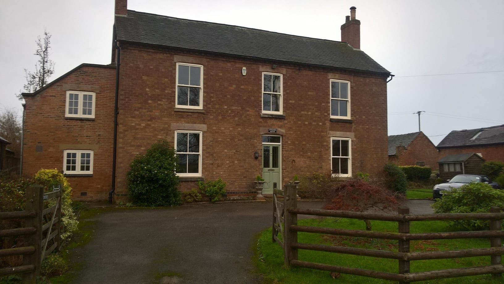 woolaton sliding sash windows painted white Victorian bars astragals brick traditional elevation