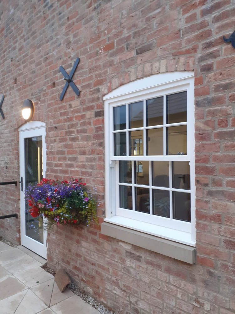 Canal Side Cottages: close shot from the front showing sash windows