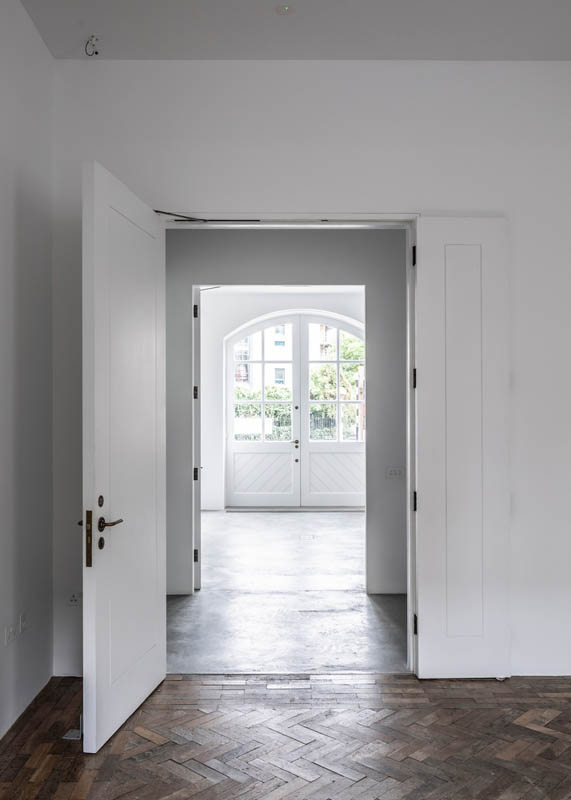 South London Gallery Fire Station: artistic shot of heritage doors from seen through several open doorways