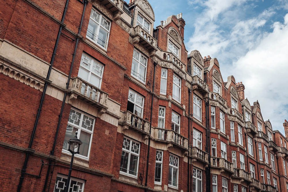 Can you put double glazing in a Grade 2 Property? image of a listed property with heritage windows