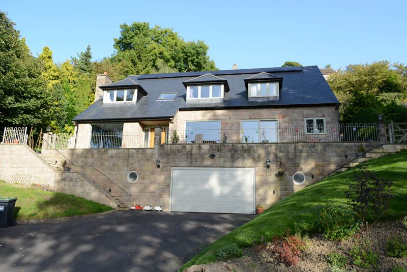 timber windows matlock wide shot of the cottage