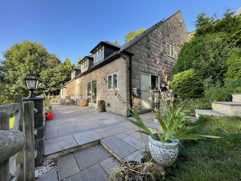 timber windows matlock left view of the cottage with patio