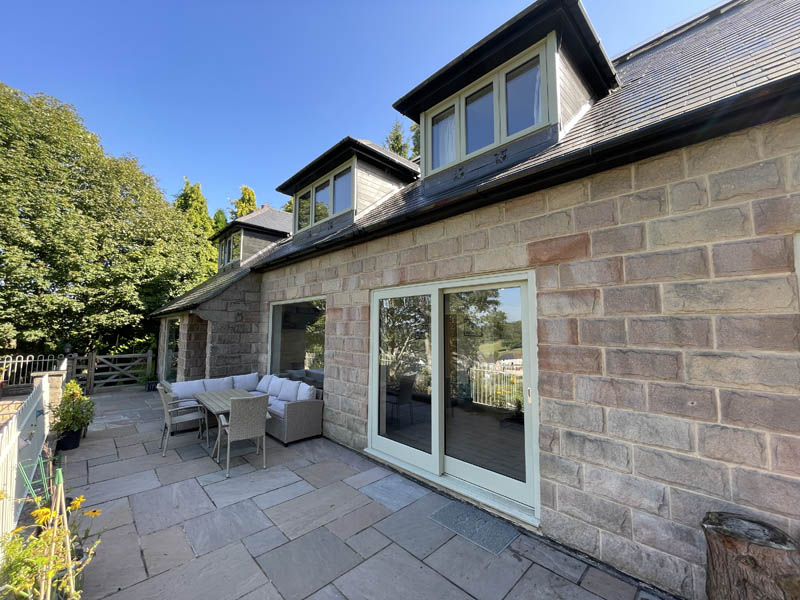 timber lift and slide doors in a stone cottage in matlock